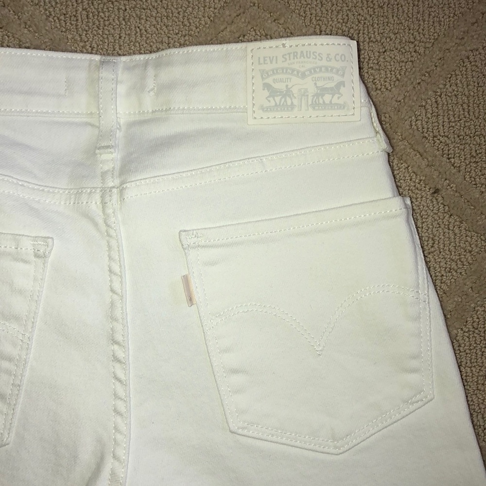 white levi’s, brand new , never worn